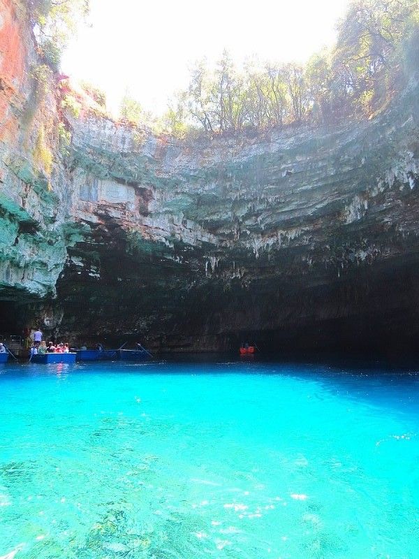 Why You Don't Want To Miss The Colorful Melissani Cave In Greece